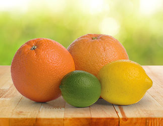Orange, lemon and lime on a table
